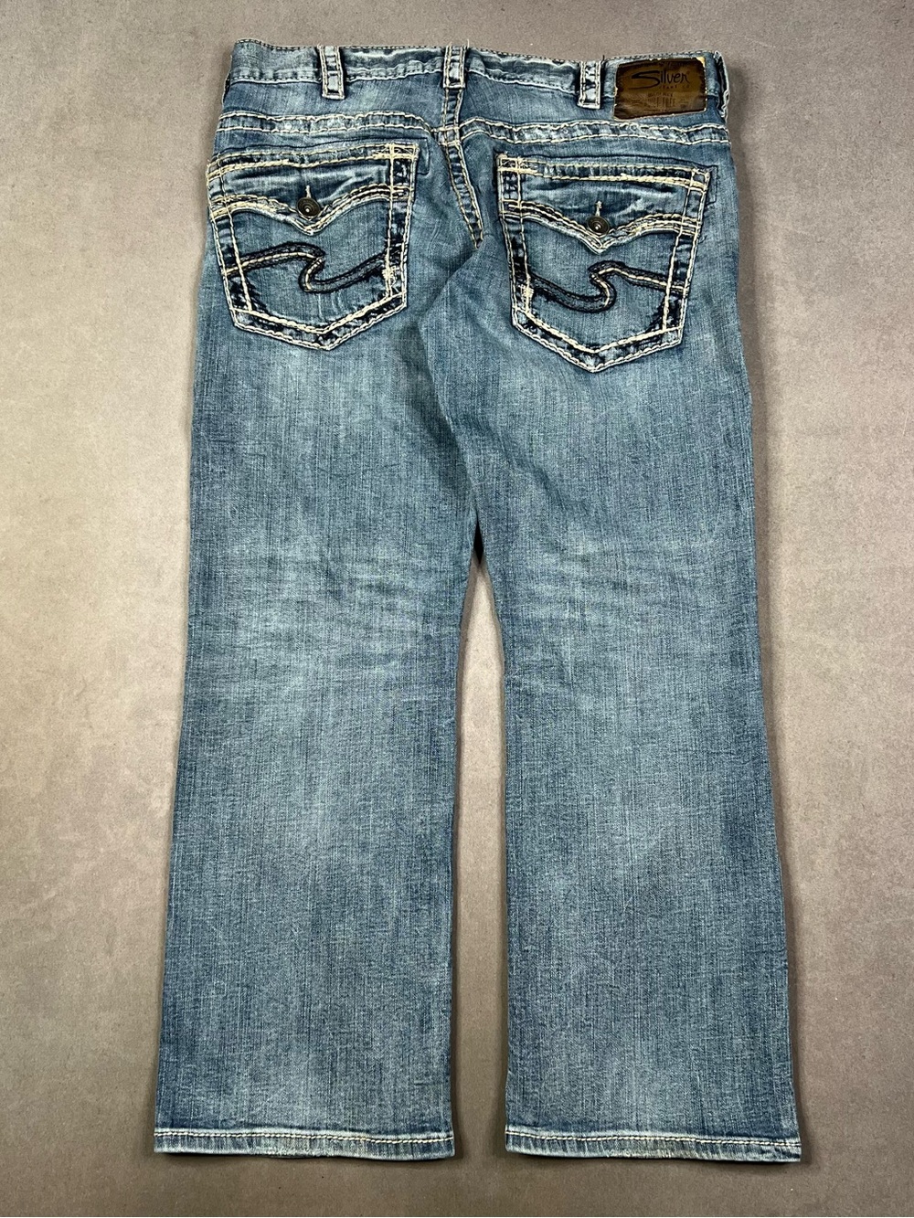 Silver Jeans Men’s Medium Blue Bootcut Denim with Signature Back Stitch